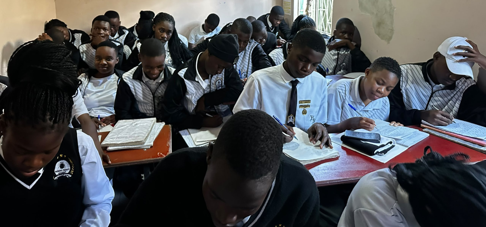 Harmony Heights learners working together during a classroom lesson